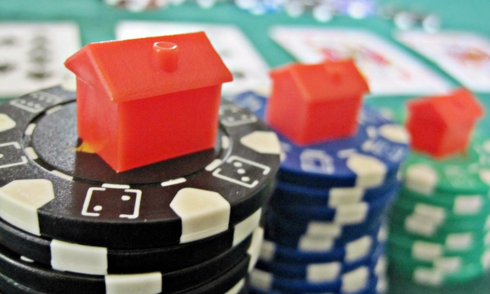 Monopoly houses and poker chips.jpg