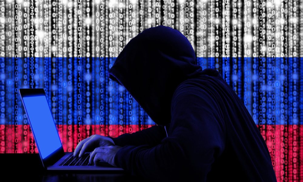 hacker with digital russian flag 152661182 bigstock scaled.jpg