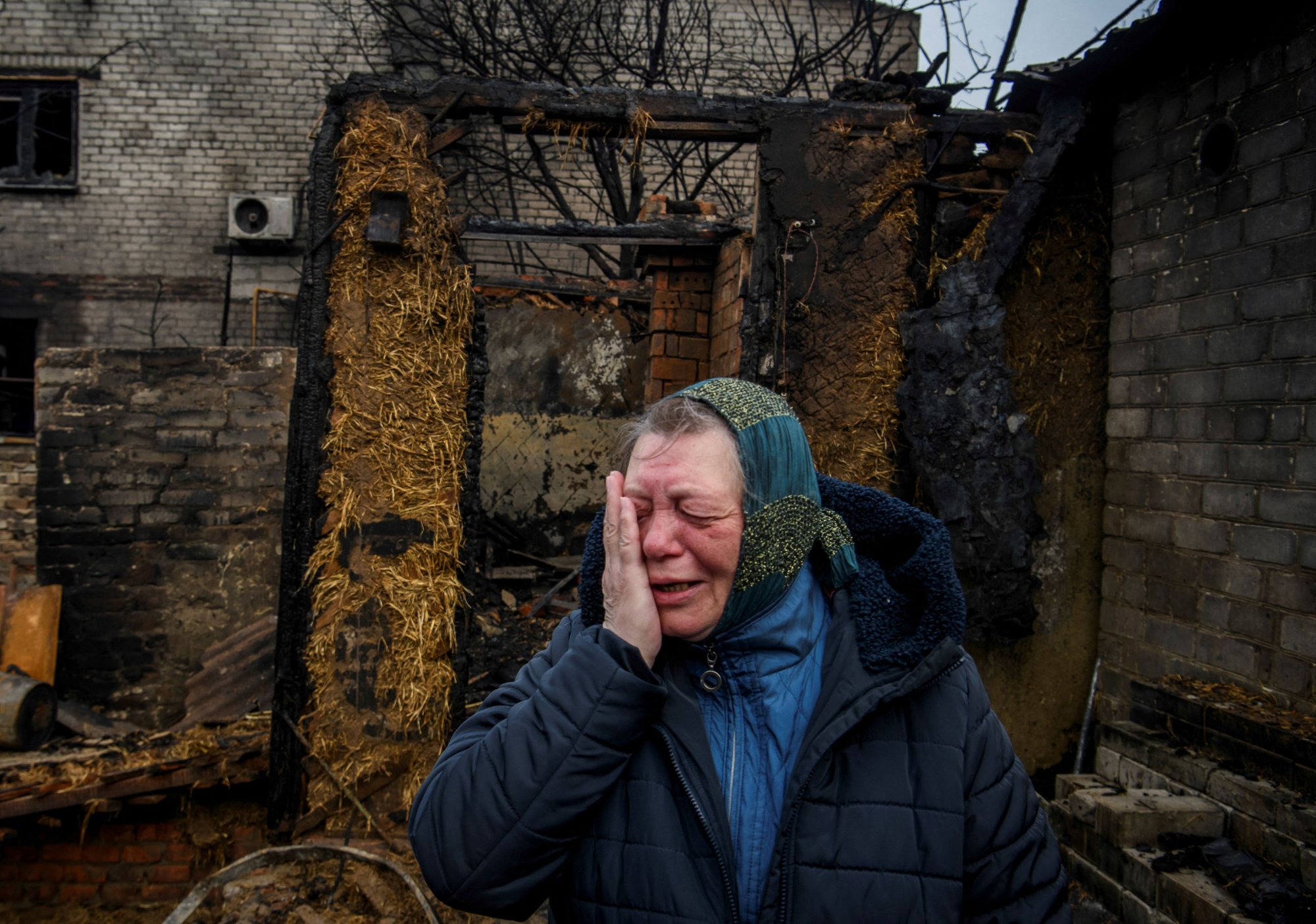 2024 02 12T132756Z 1457719523 RC2W06ARCFM9 RTRMADP 5 UKRAINE CRISIS FUNERAL FAMILY.jpg