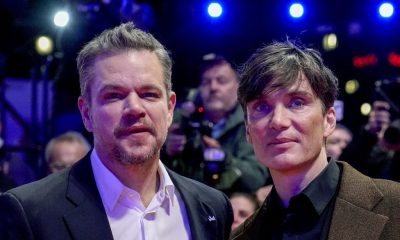 Actor Cilian Murphy right and producer Matt Damon stand on the red carpet outside the Berlinale Pala.jpeg