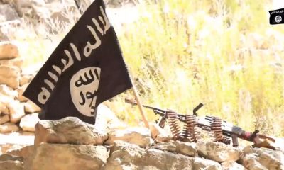 ISIS Flag and Rifle Sept 2020.jpg