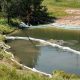 car in geyser yellowstone 620x350.jpg